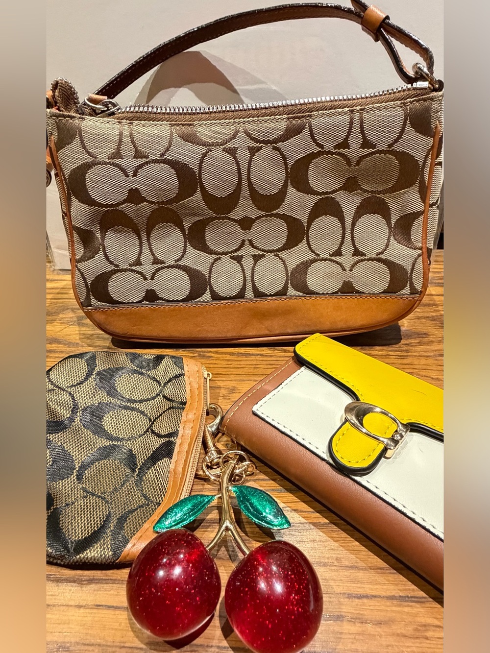Coach Beige and Brown Signature Canvas Crossbody, Cherry Charm and coin purse.